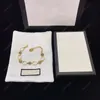 Pulseras de diseño Cadena de oro Pulsera de amor Joyería Carta de lujo Colgante G Pulsera para mujeres Hombres Tigre Crisantemo Encanto Bijoux Schmuck