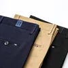 Pantaloni da uomo Casual Moda Primavera Abito elastico da uomo Vita alta Dritto Giovane Slim Tide Marca Royal Blue Bussiness Pantaloni per