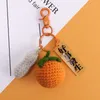 Keychains Strawberry Wool gebreide sleutelhanger vrouwelijke schattige creatieve praktische cadeau -weggeefactie tas hanger