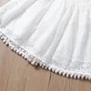 Fille robes enfant en bas âge enfants bébé filles été élégant couleur unie évider dentelle glands manches fête princesse robe doux vêtements