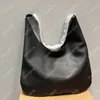 Läder axelväskor lyxdesigner totes väska stor kapacitet underarm handväskor kvinnor handväska mode pochette casual shopping plånbok mjuk läder handväska konstverk