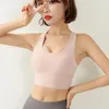 Yoga Outfit Women Bras Cross Beauty Back أربعة صفوف من ملاك ملزم الملابس الداخلية للياقة البدنية