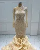 Exquisite Meerjungfrau Brautkleider Champagner Spitze Luxuriöse abgestufte Rüschen Schleppe Brautkleider Kleid Arabisch Aso Ebi