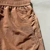 2024 Heren Casual metalen stenen shorts ontspannen multi -kleuren pocket Drawtring nylon sport korte broek voor mannen