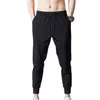 Männer Hosen 2022 Seide männer Atmungsaktive Casual Kordelzug Kleidung Jogger Jogginghose Fitness Mode Knöchel Banded Taschen Hosen