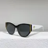 Designer Mannen vrouwen Goud Zwart Cat Eye Zonnebril 6054 stijlvolle zonnebril UV400 bril kwaliteit luxe uniek design frame UV bescherming persoonlijkheid