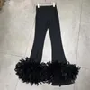 Pantaloni da donna a vita alta da strada pantaloni elasticizzati dimagranti cuciture con piume a zampa d'elefante per le donne slim estate autunno nero 2022