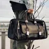 ダッフルバッグ高品質の本物の革大容量男性女性荷物袋週末屋外旅行デザイナーラグジュアリーリアルカウハイドダッフル