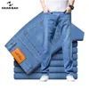 Jeans da uomo SHAN BAO Jeans elasticizzati leggeri allentati dritti 2022 Jeans in denim sottile da uomo stile classico estivo casual da uomo T221102