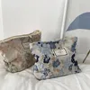 Sacs de maquillage en toile, sac à cosmétiques imprimé de fleurs en Relief français, pochette de voyage de grande capacité pour femmes, pochettes de rangement de maquillage