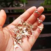 CHANDELIER CRISTAL TOP QUALIDADE 200PCS 30mm Gold 3Points Copper Butterfly Fivelele/Tie Clips Bad Curtain Acessórios