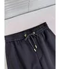 Pantaloni estivi in ​​cotone mista tendenza maschile pantaloni da donna piedi sportivi cintura stretta