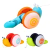 Jogos de novidade Pull String Cartoon Snail Car Toy Baby Aprenda a rastejar e brinquedo com a luz Music Early Education Toys for Children 221105