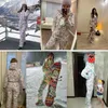 Jackets de esqui 2023 Terno de esqui de uma peça de uma peça Mulheres macacões esportes ao ar livre Jaqueta de snowboard quente Conjunto de macacões à prova d'água