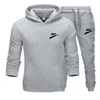 Nouvelle marque hommes survêtement loisirs sweats à capuche pantalons deux pièces ensembles vêtements de sport laine sweats Jogging hommes ensembles survêtements