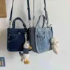 オリジナルの韓国の絶妙なミニデニムバッグ女性新しいトレンディクールなショッピングハンドバッグ
