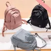 Eenvoudige rugzak vrouwen mode solide kleurreizen nylon waterdichte rugzakken casual studentenschooltassen