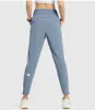 LL Kadınlar Yoga Dokuzuncu Pantolon Push Fitness Koşu eşofman altı Yumuşak Yüksek Bel Kalça Kaldırma Elastik Rahat Pantolon 7 Renkler L200106