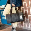 Duffel Bags Fashion Man Travel Duffel Bag Luxury Designer Plaid Leather Large Capacity Handbag Trip Boarding Organizer Pack Men Gym Bag 221105
