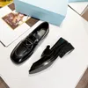 Mocassini da donna in pelle nera Scarpe Mocassini da donna Mocassini Preppy Penny Loafer con tacco piatto sulla tomaia Casual da sposa