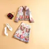 İki parçalı elbise moda bahar/yaz kadın baskılı üst yarım etek mizaç zarif ince stil