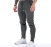 Pantalones de hombre Diseñador Carta Imprimir Chándales casuales Joggers negros Pantalones Moda Hip Hop Pantalones de cintura elástica