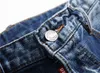 Nowe punkowe w stylu męskie spodnie dżinsowe Urban Fashion Denim Cargo CARGO CARGOTES BOCE POIRTET DINIAN FOR MEN BAWIED Modne spodnie Pantal232a