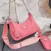 Designers väskor högkvalitativ man kvinnor lyxiga handväskor hobo purses lady handbag crossbody axel kanal totes mode plånbok triangel väska