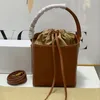 Vierkante emmertas draagtas handtassen vrouwen crossbody handtas lederen schoudertassen kalfsleer materiaal drawcord opening lange riem klep portemonnee