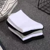 Mens socks Wholesale Sell All-match Classic black white Women Men Breathable Cotton mixing Football basketball Sports Ankle Long sock