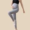 マタニティドレスハイウエスト妊娠レギンス妊娠中の女性のためのスキニーマタニティ服お腹のサポートニットレギンズボディシェイパーズボン221107