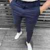Calça masculina masculino botão de lápis com zíper de cor sólida cora -réias de bote de streetwear midwear