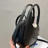 デザイナートート女性バッグハンドバッグショルダーバッグビームマウスパッケージダブルハンドル小さなウォレットラグジュアリークロスボディ電話総合スタイルファッション特別な形