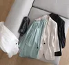 Abiti da donna Abito alto fisso a righe in seta brillante con vento fisso Manica sette centesimi estivi Giacca verde menta Stile sottile Blazer drappeggiato femminile Donna