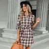 Ropa de otoño para mujer Vestido de diseñador Otoño de un solo pecho Moda a cuadros Lazo Cintura ceñido al cuerpo Vestidos camiseros de manga larga