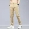 Calça masculina 2022 calças masculinas primavera verão fino verde cor sólida moda de bolso de bolso