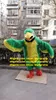 Costume de mascotte à fourrure longue jaune vert Parrot Parakeet Macaw Carton de dessin animé Carrise de personnage Promotion Hotel Pub ZZ7635