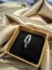 Favor de festa designer S925 Sterling Silver Lover Ring incrustado com diamantes artificiais verdes e roxos azuis para homens e mulheres