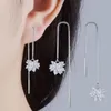 Boucles d'oreilles pendantes Real. Bijoux en argent sterling 925 à tirer à travers l'enfileur de chaîne de fleurs longue GTLE279