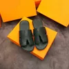 Zapatillas de diseñador Venta caliente Fashion Paris Luxe Men's Oran Heritage Sandalias de piel de becerro de alta calidad Izmir Flip Flop Men grande Wm Otui