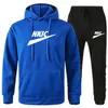 2023 Marca de moda Blue Tracksuit Men Manga Longa Capuz Sports Sports Definir blusas de pulôver e calças de corrida roupa casual