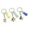 Partihandel Autism Keychain Puzzle Piece Ribbon Awareness Keyrings Tassel Nyckelkedjan Nyckelhållare Tillbehörsmycken