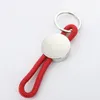 Sublimatie blanco Accessoy Diy Keychains Round Nylon Cord Blue Red Designer Keychain Wallet Handtas Liefhebbers Auto Key Ring sieraden voor vrouw man vriend Kerstcadeau