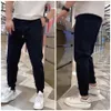 Herenbroek Hoge vrachtbroek voor Badge Sweatpants Dames jeans Casual Men Hip Hop Streetwear Man Joggers Aziatische maat