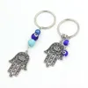 الجملة المحظوظ Hamsa Fatima Hand Key Rings Keychain Carning Keyring Blue Turkish Evil Eyer Key Chain for Women Men المجوهرات هدية