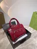 Kvinnlig lyxdesigner handväska ny mode personlighet liten färsk enkel axel messenger väska presentlåda fabrik låg pris direkt försäljning