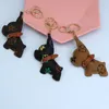 Puppy Key Chain Pendants Accessoires Cléchains mignons Sac à dos Hanging Ornements Fashion Lanyards