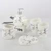 Set di accessori per il bagno WHYOU Bottiglia di emulsione creativa Accessori per il bagno Lavaggio di alta qualità Tazza per gargarismi Abito per spazzolino Regalo di nozze di moda
