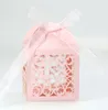 50pcs/Lot Cross Cross Hollow Laser Cut Carriage Tavers Molevers Homes Candy Cookies Boxes with Ribbon Baby Shower Party Supplies CL1395