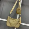 Modna torba nylon pochette turbor luksurys portrerzy Projektanci klasyczni torby retedycji lady damski crossbody hobo ramię 2224M